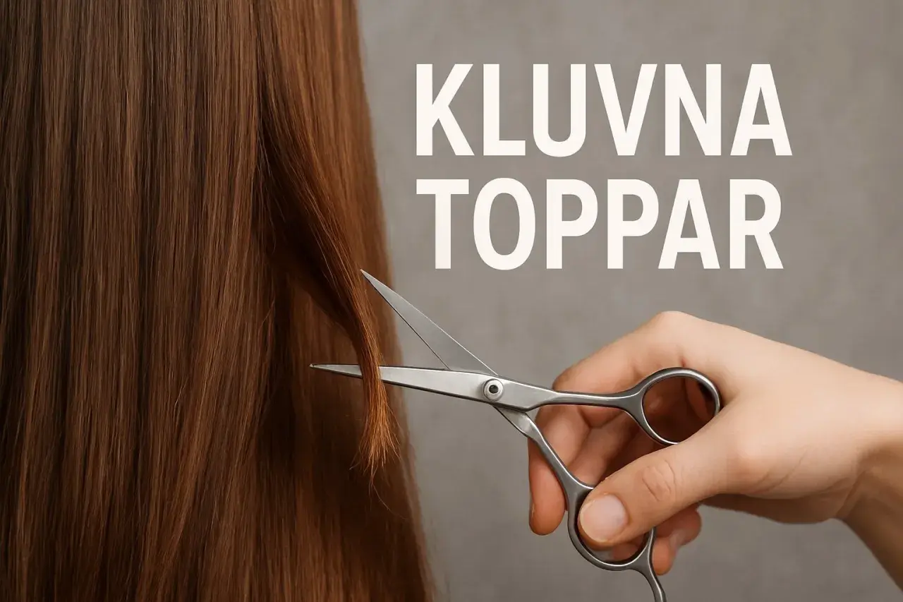 En hand klipper av kluvna toppar på slitet hår.